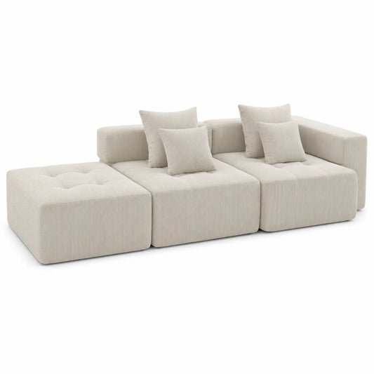 Sofá modular de pana beige con cojines
